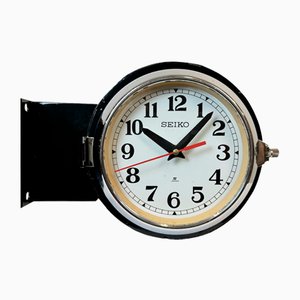 Reloj de pared marítimo de doble cara negro de Seiko, años 80