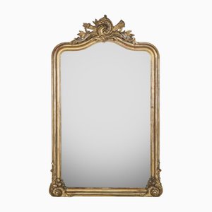 Espejo estilo Luis XV de madera tallada y dorada