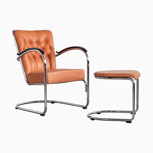 412SGE Armchair with Footstool in Chrome and Padded Leather by W.H. Gispen, 2020, Set of 2