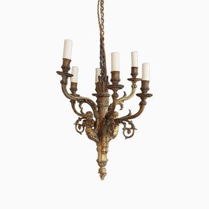 Lámpara de araña de metal dorado con seis brazos de principios del siglo XX