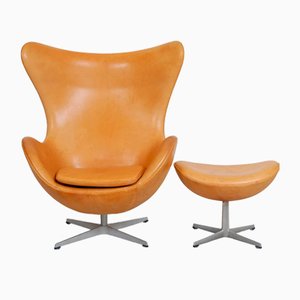 Egg Chair with Footstool in Natural Leather by Arne Jacobsen, 2000s, Set of 2