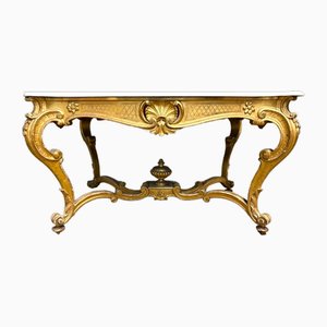 Consola estilo Luis XV en madera dorada