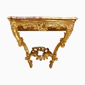 Consola de madera tallada y dorada con tablero de mármol, siglo XVIII