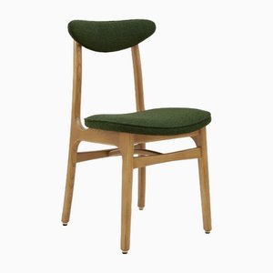 Stuhl aus Boucle Flaschengrün & Naturholz, 2023