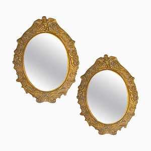 Espejos de resina dorada, siglo XX. Juego de 2