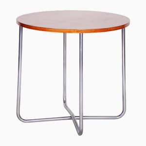 Mesa de centro Bauhaus redonda tubular de cromo y haya atribuida a Vichr, años 30