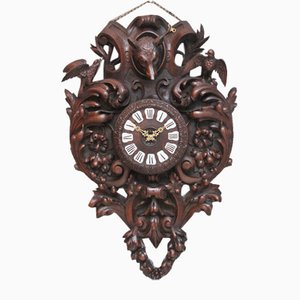 Reloj de pared francés de roble tallado, década de 1880