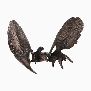Escultura de alas de metal de Quinto Ghermandi