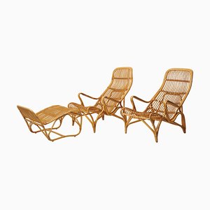 Swedish Modern Rattan Lounge Chairs and Footstool attributed to Bruno Mathsson for Dux, 1970s, Set of 3