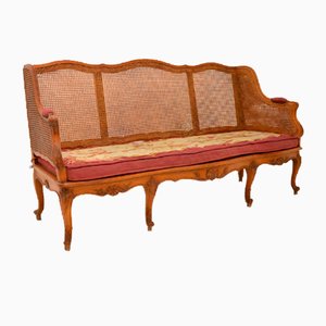 Französisches Bergere Sofa aus geschnitztem Nussholz, 1870er