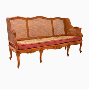 French Bergere Sofa in Carved Walnut, 1870s