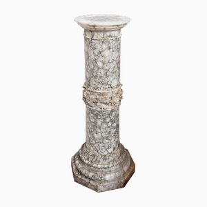 Columna romana antigua de alabastro florido