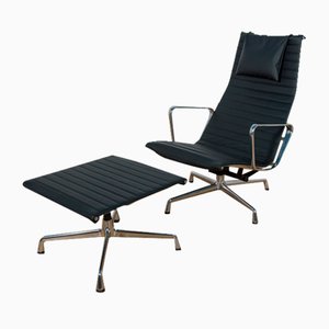 Poltrona Ea124 ed Ea125 Alu Group con poggiapiedi di Charles & Ray Eames per Vitra, anni '80, set di 2