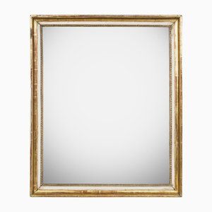 Espejo francés rectangular de madera dorada con vidrio zorro