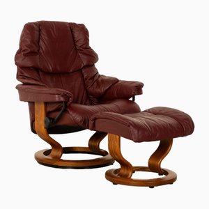Butaca Stressless Reno de cuero con taburete. Juego de 2