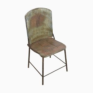 Silla industrial vintage de metal