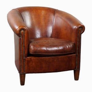 Club chair vintage in pelle di pecora