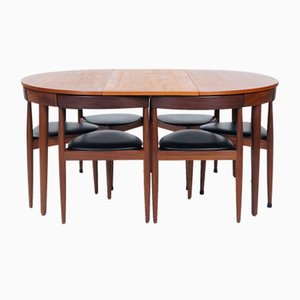 Juego de comedor Roundette de teca con mesa y sillas extensibles de Hans Olsen para Frem Røjle. Juego de 7