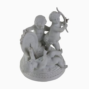 Figura de Cupido vintage de porcelana