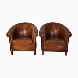 Sillones Club holandeses vintage de cuero en color coñac. Juego de 2