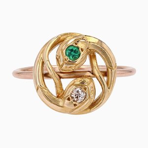 Französischer Schlangenring aus 18 Karat Gelb- und Roségold, 19. Jh. mit Smaragd und Diamant