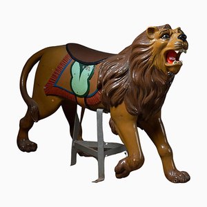 Figura antica di giostra di leone in legno intagliato