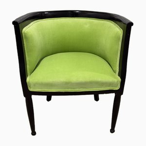 Grüner Sessel mit runder Rückenlehne