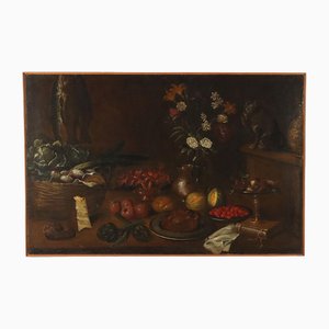Artista italiano, Bodegón con frutas, verduras y gato, década de 1600, óleo sobre lienzo