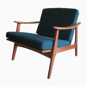 Dänischer Sessel mit blaugrünen Kissen, 1960er