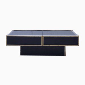 Mesa de centro abierta de vidrio negro y metal dorado atribuida a Maison Lancel, Francia, años 70