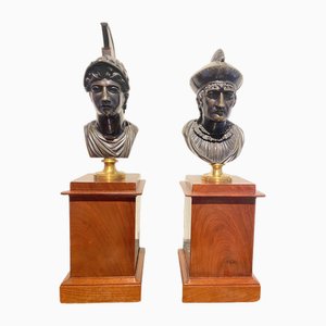 Bustos de bronce sobre bases de caoba, siglo XIX. Juego de 2