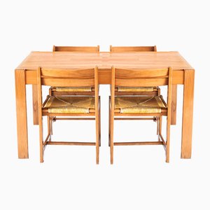 Mesa extensible y sillas de diseño racionalista de madera de olmo, Francia, años 70. Juego de 5