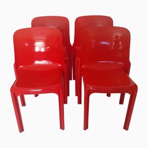 Mesa Stadium y sillas Selene en rojo de Vico Magistretti para Artemide, Italia, años 70. Juego de 5