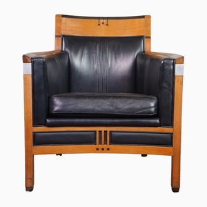 Art Deco Sessel mit schwarzem Leder und Akzenten