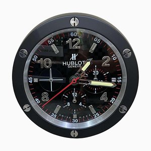 Reloj de pared negro de Hublot