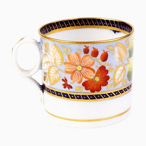 Taza de café georgiana inglesa de porcelana policromada, siglo XVIII