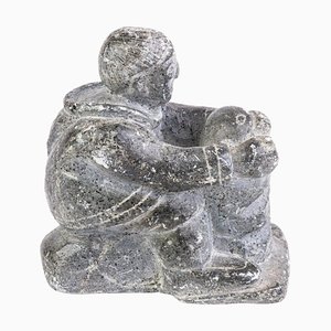 Canadian Inuit Man with Seal Stone Sculpture