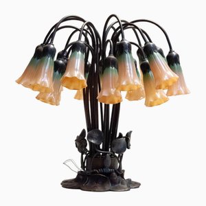 Lampada da tavolo Tiffany Lilly con 18 paralumi in vetro artistico in bronzo, anni '80