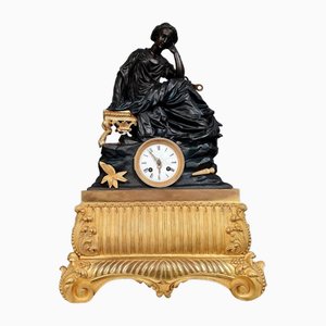 Orologio a pendolo monumentale Impero in bronzo dorato