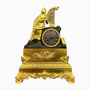 Péndulo de bronce del Imperio del siglo XVIII