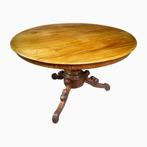 Mesa de comedor redonda de madera