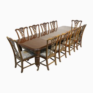 Mesa de comedor victoriana con 3 hojas extensibles y sillas. Juego de 11
