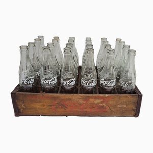CN. 24 Bottles of Coca Cola, 1960s, Set of 24