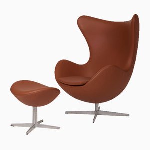 Leather Egg Lounge Chair and Footstool by Arne Jacobsen, Set of 2