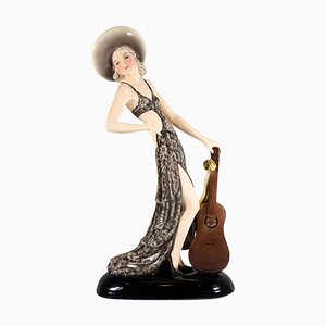 Lady with Hat and Guitar Figure attributed to Stephan Dakon for Goldscheider, Vienna, 1934