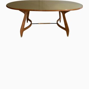 Mesa de comedor oval de madera, vidrio y latón atribuida a Vittorio Dassi, Italia, años 50