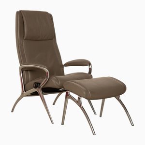 Fauteuil James en Cuir Gris Taupe avec Tabouret de Stressless