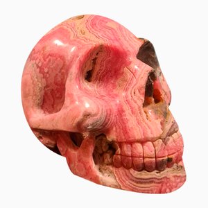 Skull in Rhodochrosite Mineral