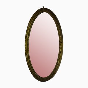 Espejo Luis XVI oval dorado, años 70