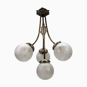 French Art Deco Four-Light Brass and Frosted Cut Glass Globe Chandelier, 1930s